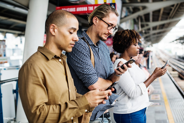 Using Smartphones on a train platform